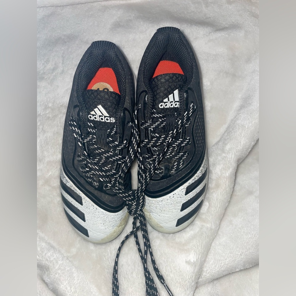 Adidas boys Black and White cleats.
